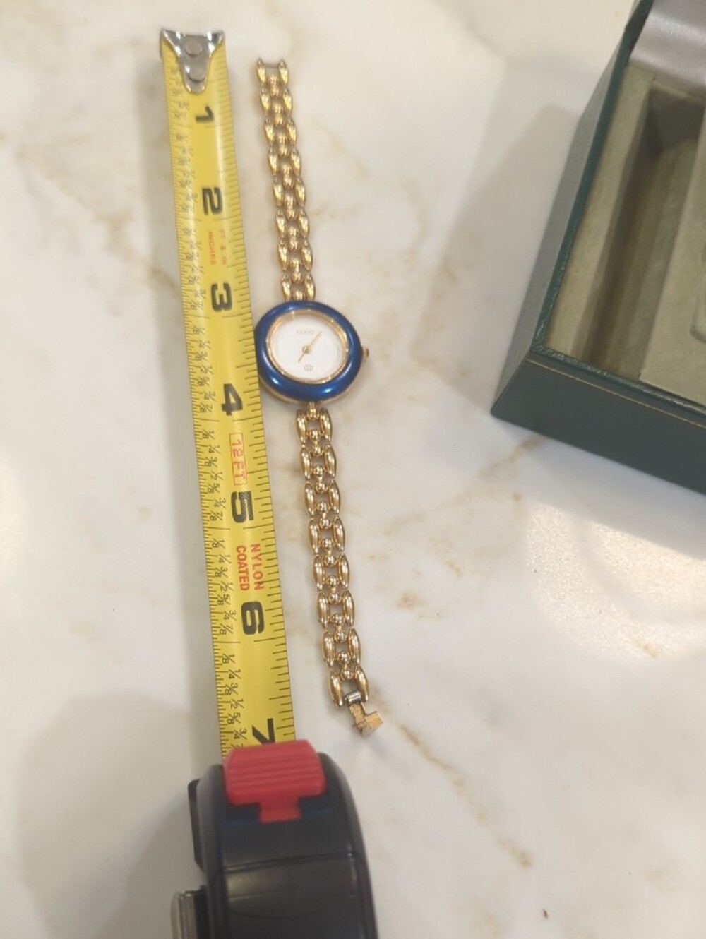 Gucci Gold Bracelet Watch with Blue Bezel and Multi-Color Interchangeable Bezels - Picture 7 of 7